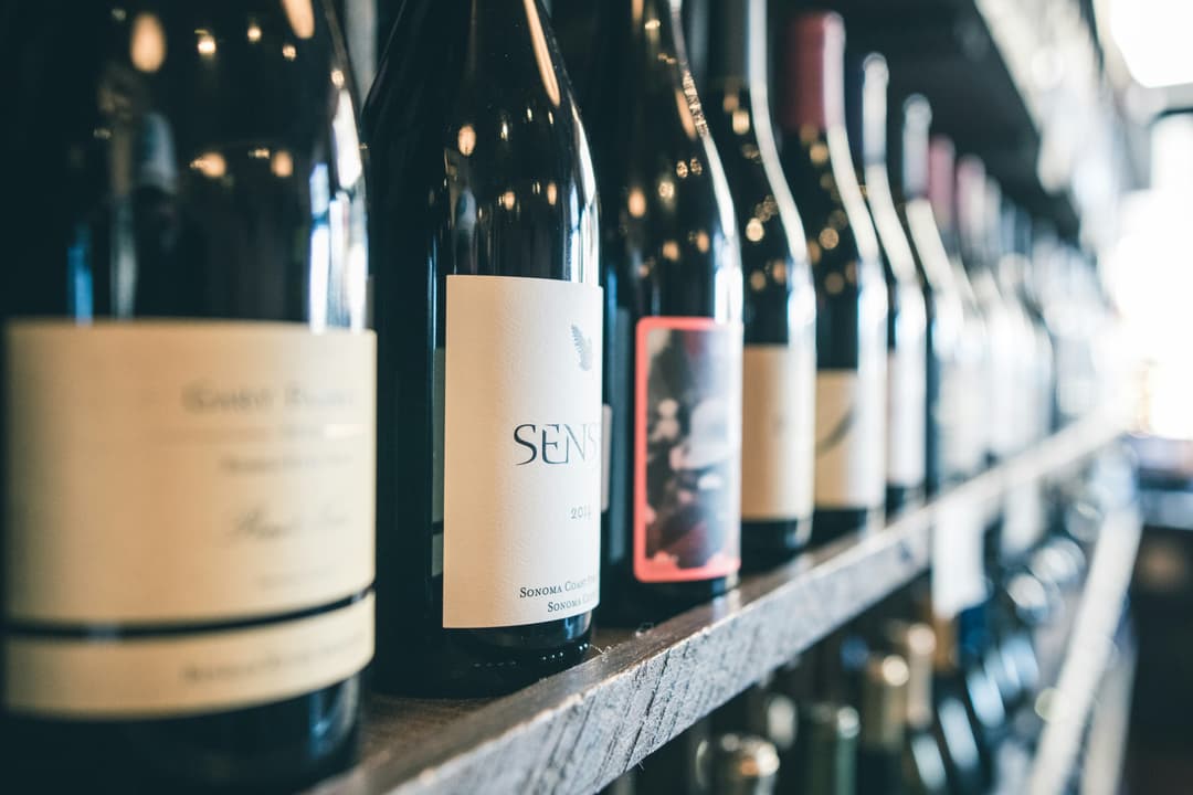 different assortment of wine bottles